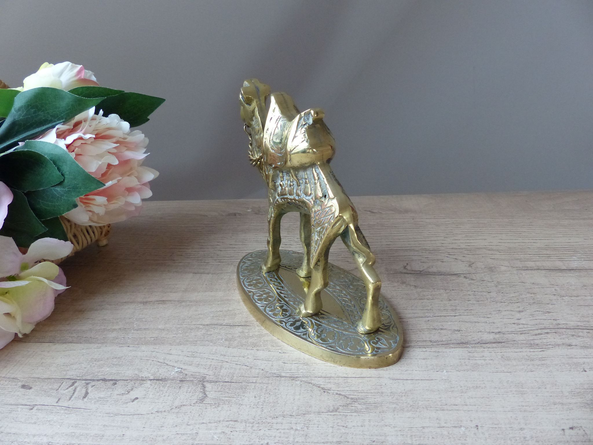 Vintage handmade brass camel figurine sculpture on base.