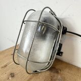 Industrial brown bakelite wall light with frosted glass, 1960s