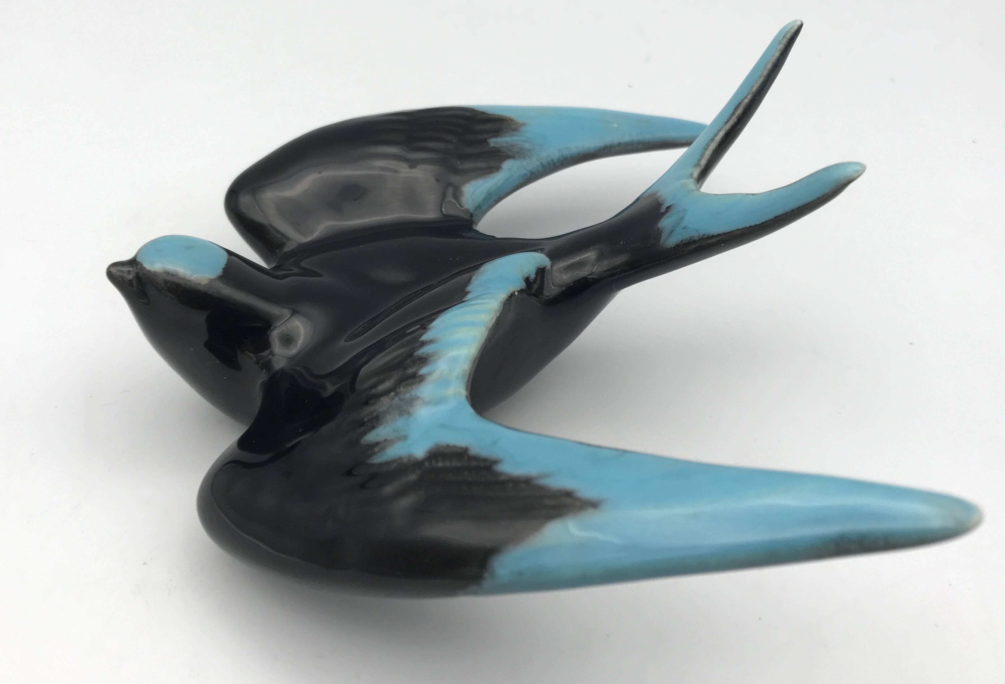 Vintage swallow in two-tone black and blue enameled ceramic