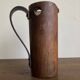 Mountain pitcher in monoxile wood and leather folk art