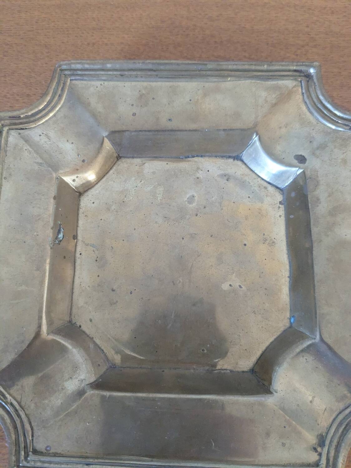 Brass pocket emptier