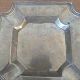 Brass pocket emptier