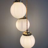 Three-light cascade suspension, vintage globes in white opaline