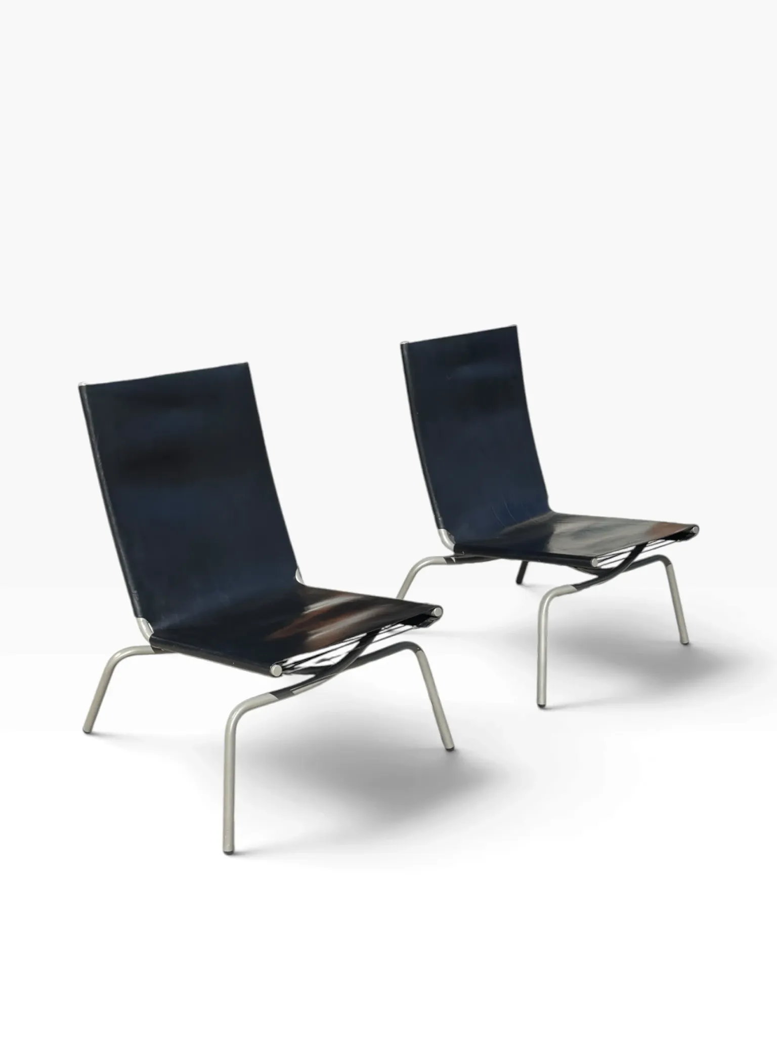Set of 2 Crossed Legged lounge chairs by Fabiaan van Severen.