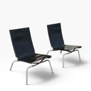 Set of 2 Crossed Legged lounge chairs by Fabiaan van Severen.