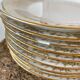 Set of 9 dessert plates in white and gold porcelain