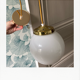 Suspension globe vintage opaline et doré