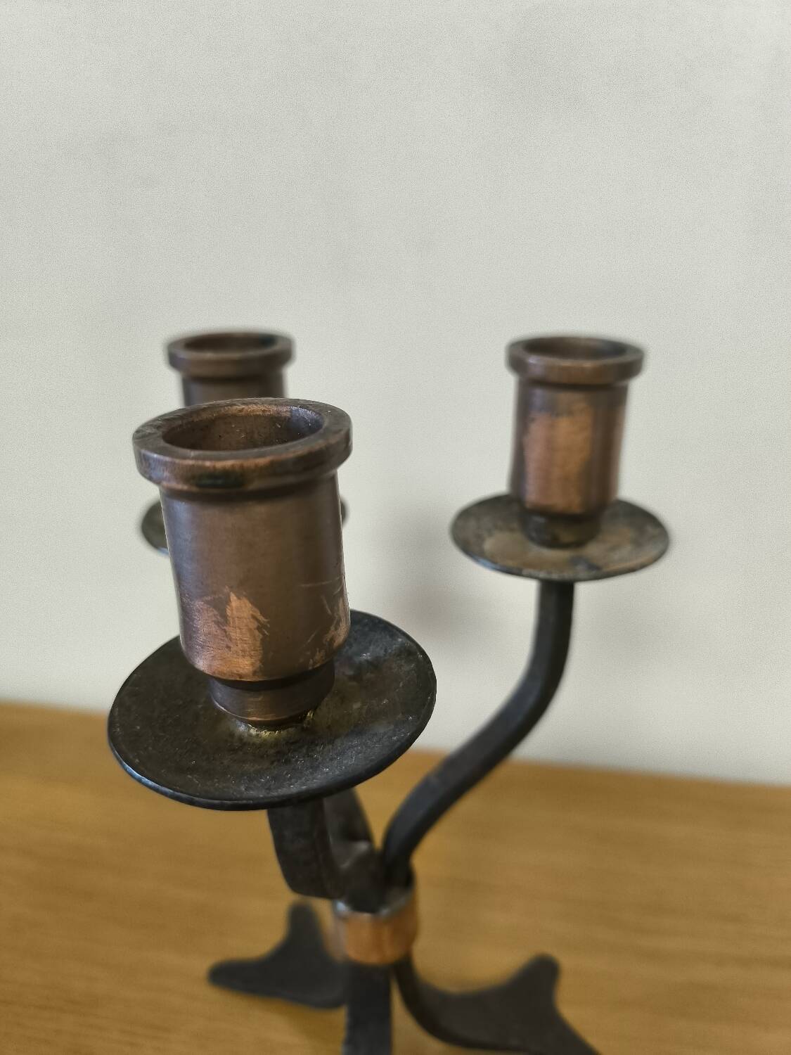 Wrought iron and copper candlestick