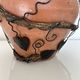 Decorative pot holder in wrought iron and wood