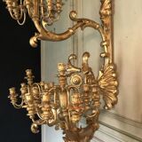Paire d’appliques monumentales en bois doré