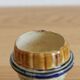 Late 19th-century earthenware egg cup in slipware