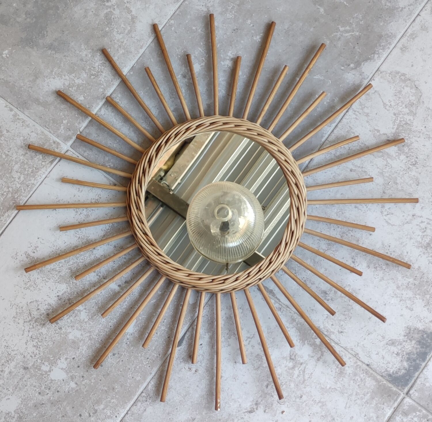Vintage rattan sun mirror