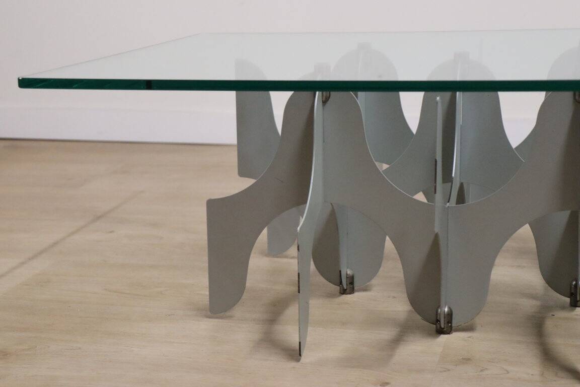 Minimalist sculptural coffee table in metal and glass