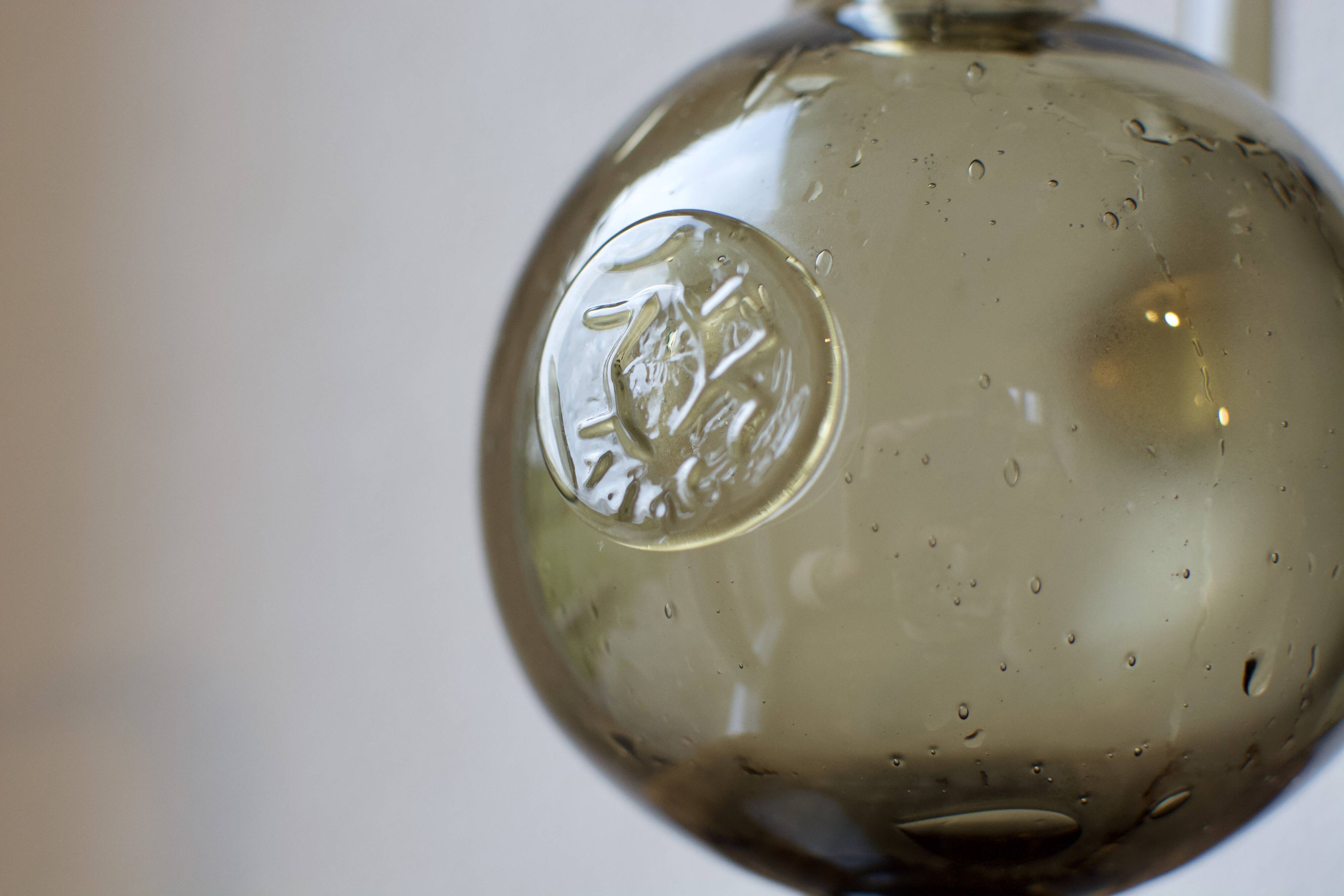 Blown glass feet carafe