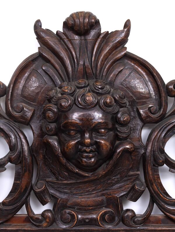 Miroir monumental ancien du XVIIIe siècle en chêne, orné d'un chérubin, de Hollande.