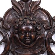 Miroir monumental ancien du XVIIIe siècle en chêne, orné d'un chérubin, de Hollande.