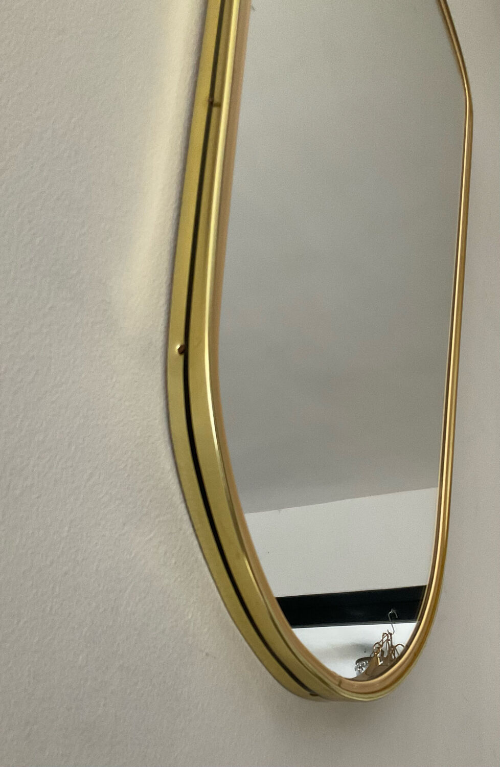 Asymmetrical free-form mirror from the 70s