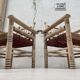 Pair of wooden armchairs and ropes