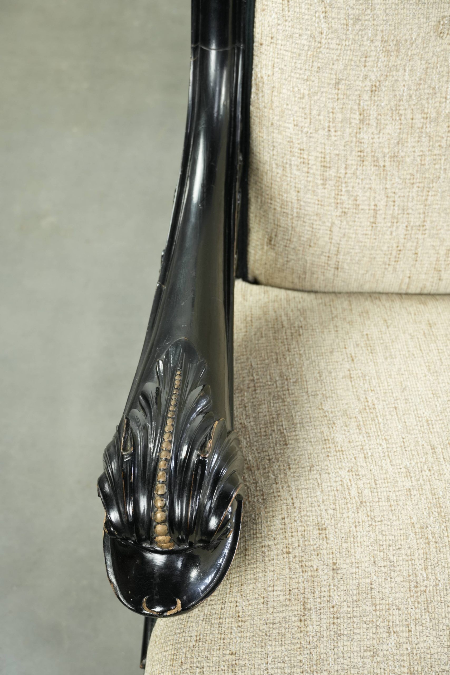 French sofa from the 19th century in Empire style with detailed armrests