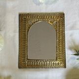 Oriental brass mirror