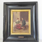 Couple seated at a table in an inn, signed oil on panel, 19th century