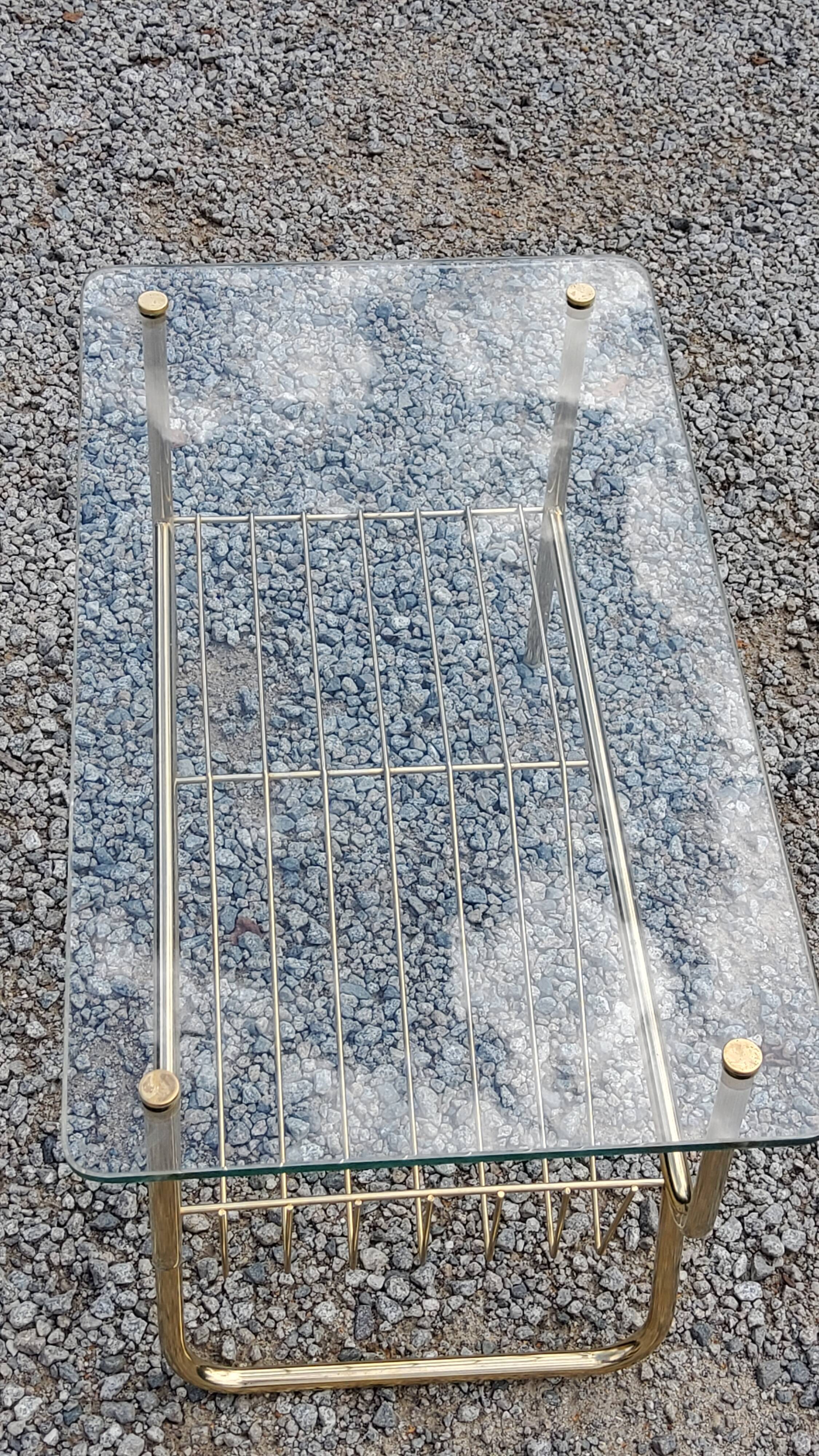 Coffee table from the 60s top glass base metal gilded