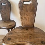 4 brutalist farm tripod chairs