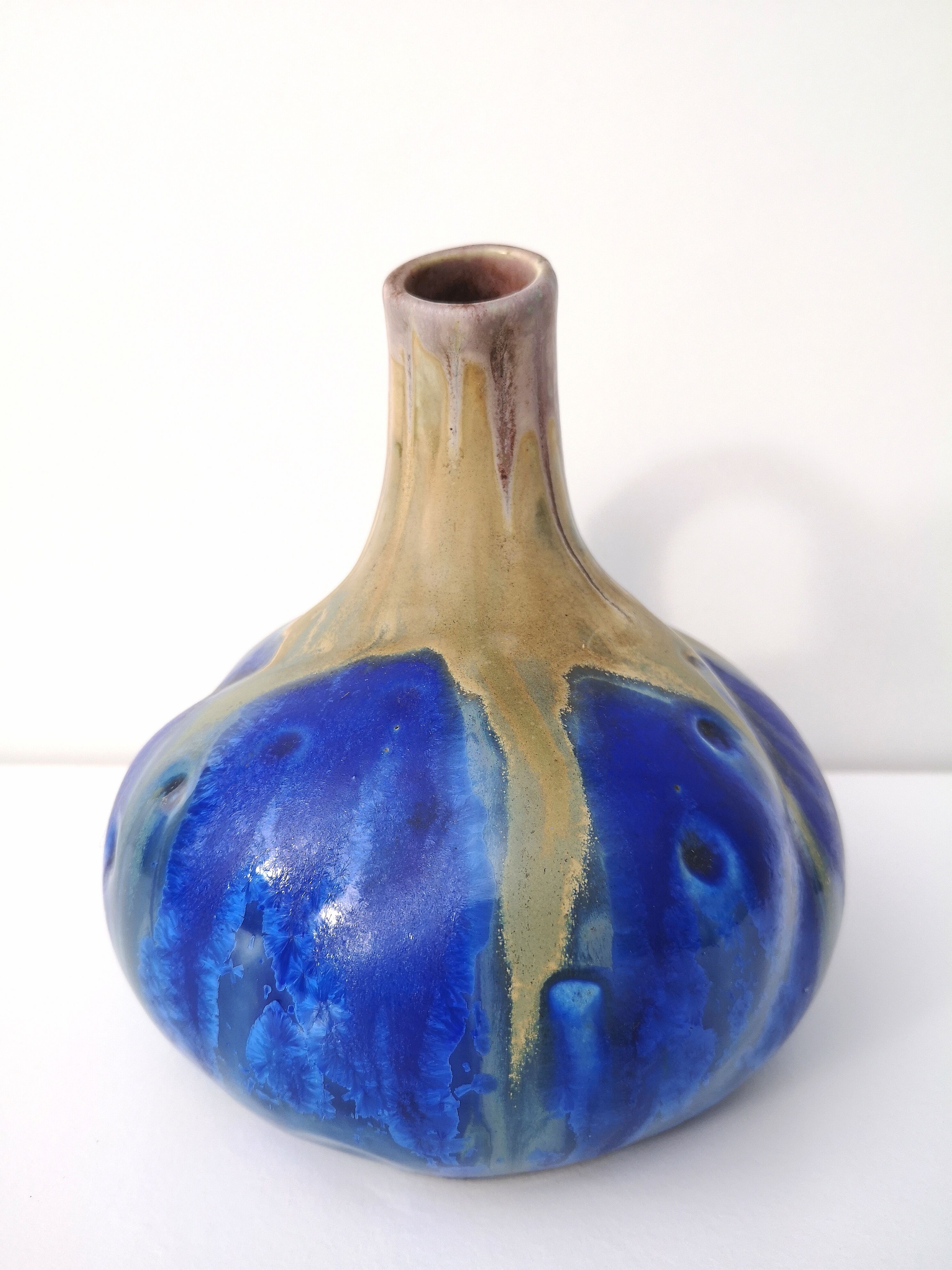 Vintage decanter in enamelled earthenware