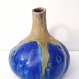 Vintage decanter in enamelled earthenware