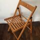 2 folding wooden chairs