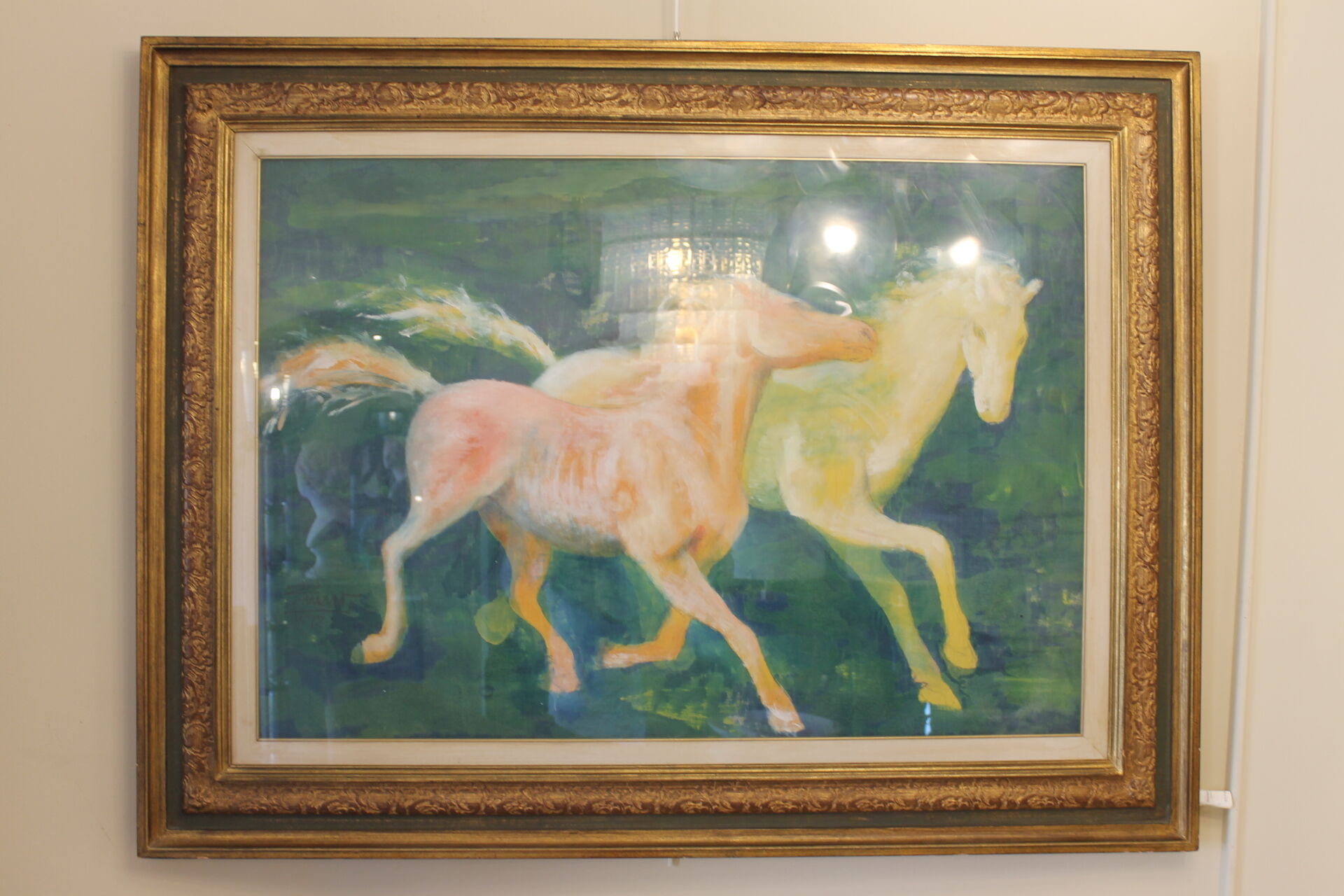 Framed painting representing horses, signed, XX th