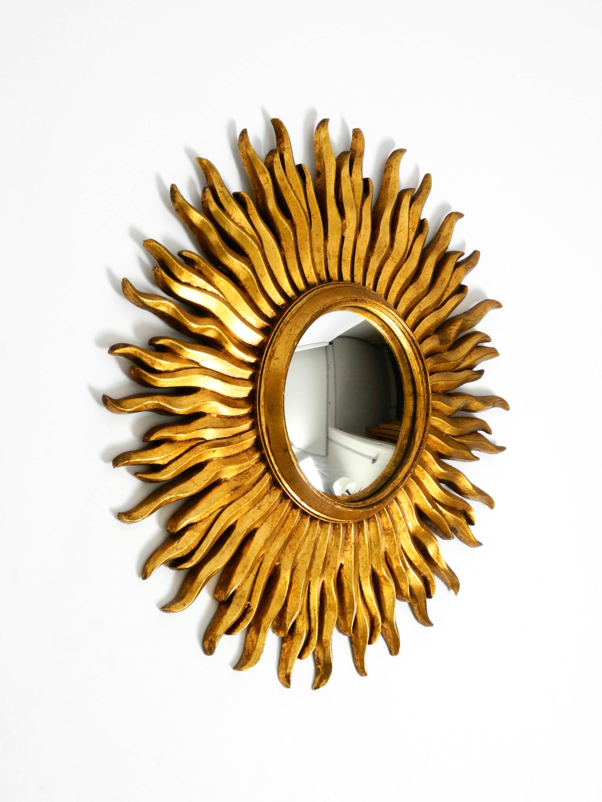Mid Century Sunburst Kovex wall mirror made of wood and resin - gold plated