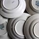 6 mismatched flat plates Terre de fer bleu Alésia Marcel Longchamp
