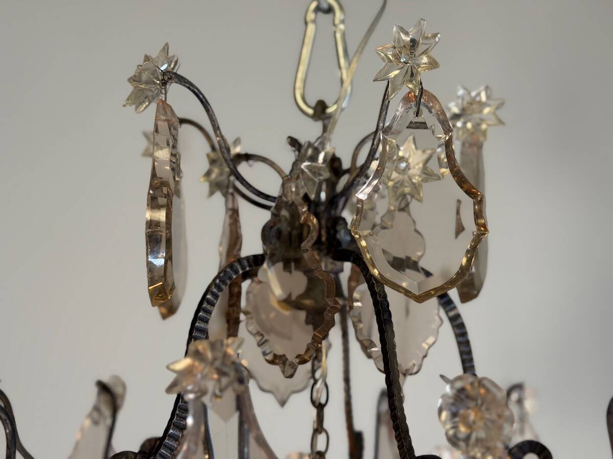 Louis XV style lantern in blackened brass adorned with cut crystal pendants, circa 1900.