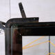 Vintage magazine holder "scoubidou" in black wrought iron.