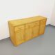 Vintage storage unit in rattan and woven rattan from the 1970s.