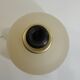 Vintage frosted glass lamp, round globe, elegant design, soft light.