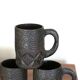 Three engraved dark wooden cups, 1960s