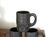 Trois tasses en bois foncé gravé années 60