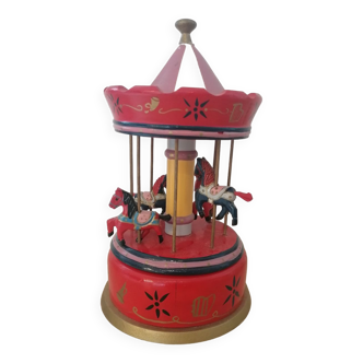 Carousel with functional music box