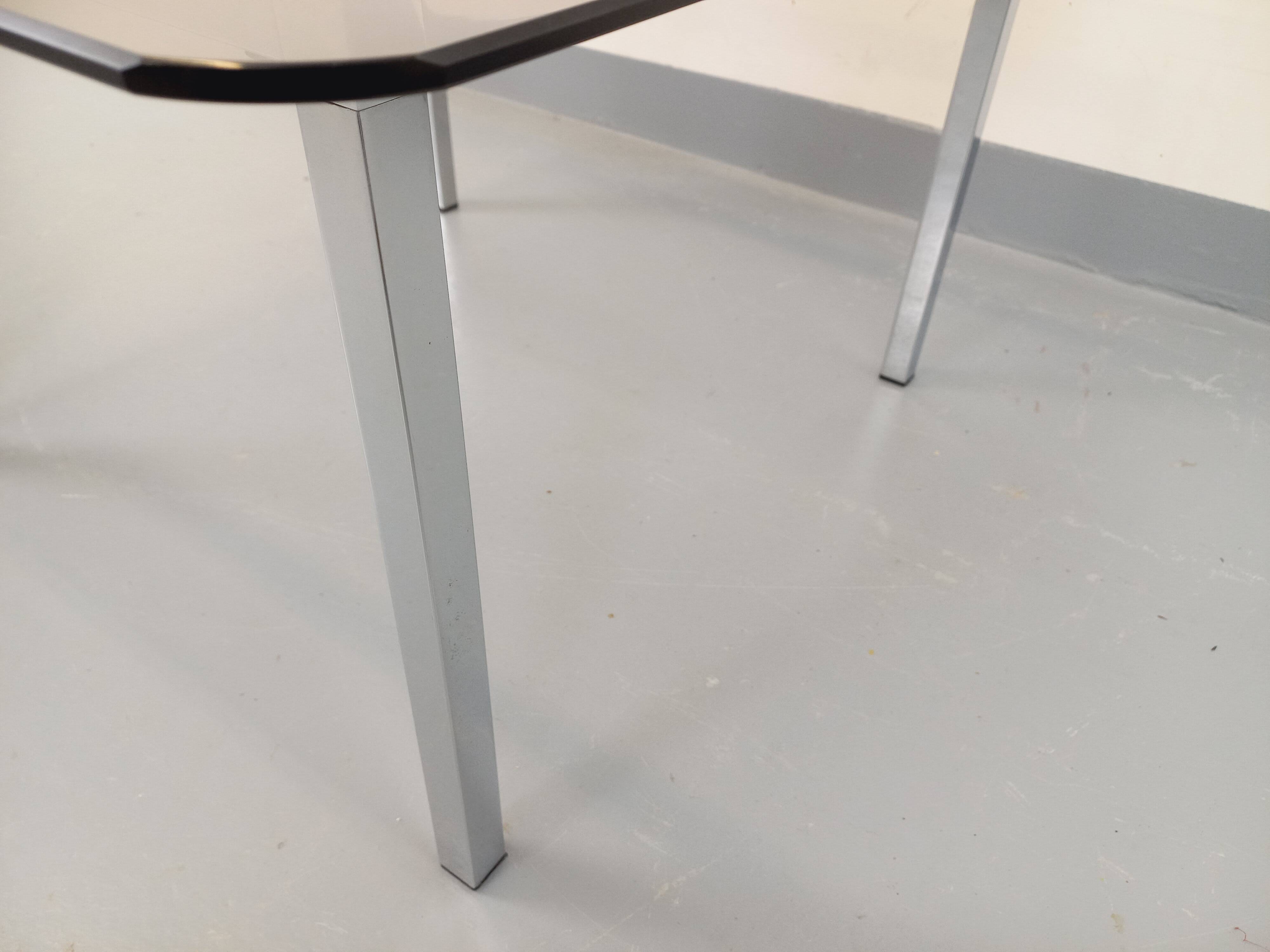 Vintage square coffee table in smoked glass and chrome metal from the 1970s.