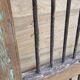 Old gate in Burmese teak and wrought iron