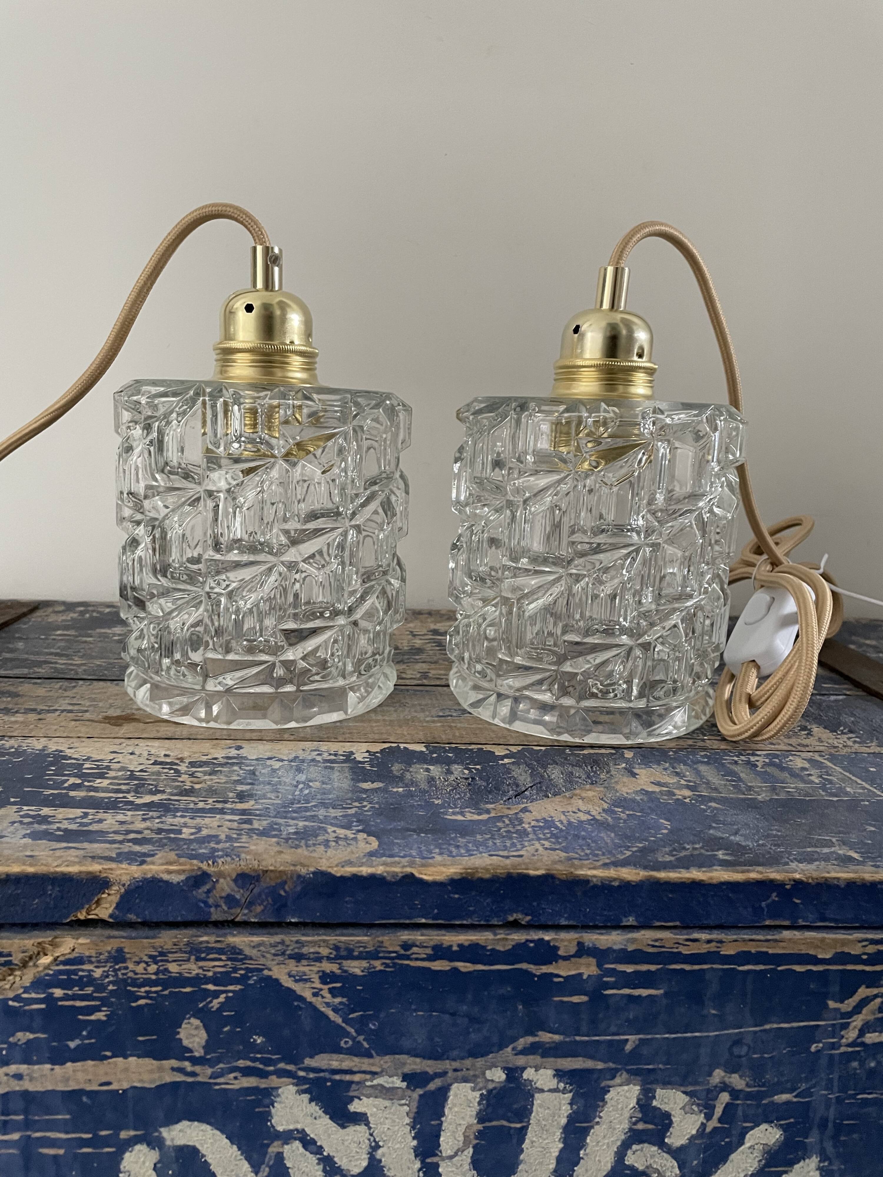 Set of two vintage electric chiseled glass walking lamps
