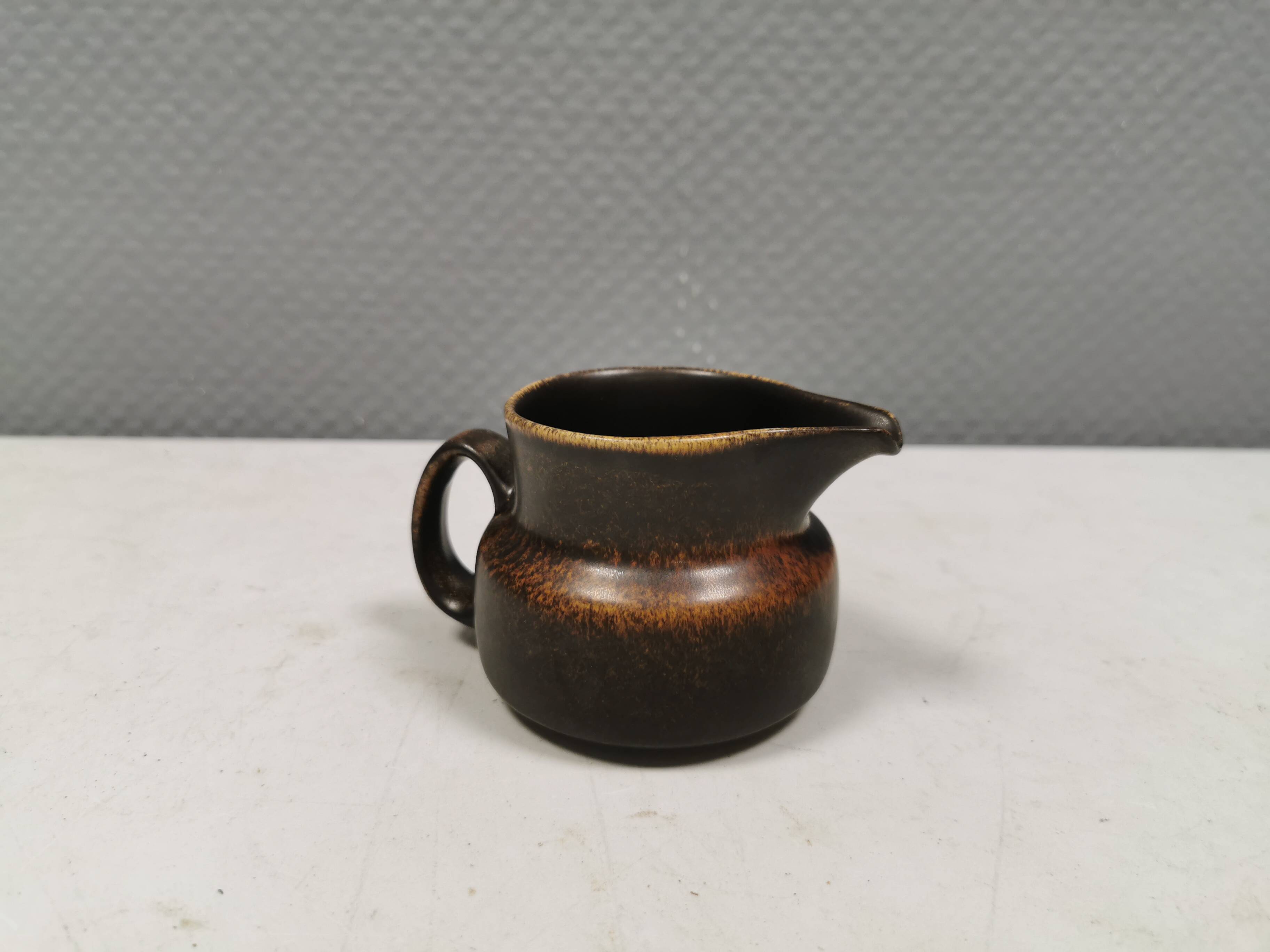 Very nice cream jug in hare fur glaze, Danish and from the 1970-80s.