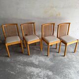 Set of 4 Scandinavian light wood dining chairs with beige polyester upholstered seats
