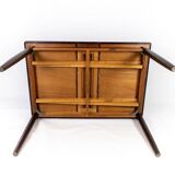 Dining table in rosewood with extentions, of danish design from the 1960s.