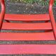 2 red metal Tolix-style chairs, France 1950