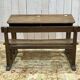 Early 20th-century oak school desk with porcelain inkwells