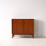 Storage cabinet with hinged doors