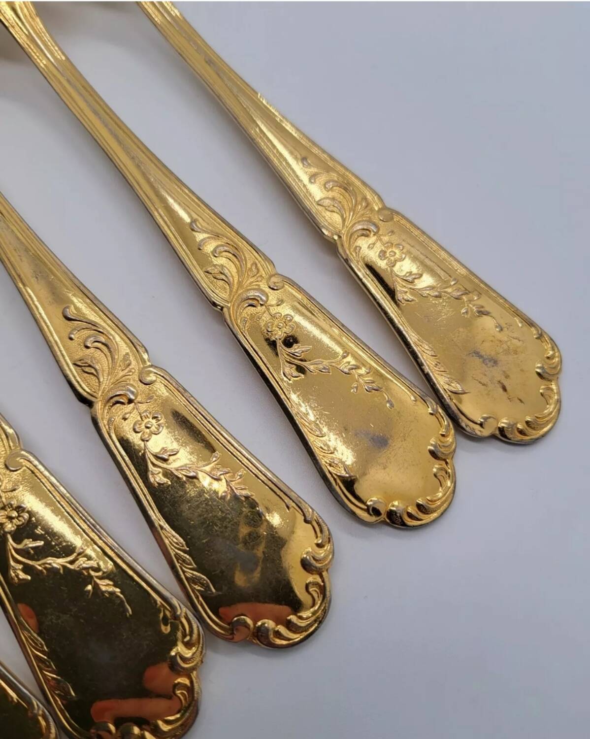 12 Table Forks in gold metal